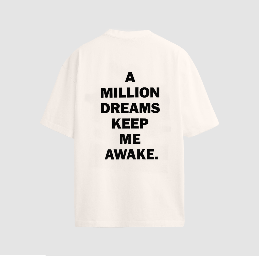 white oversized LIVINA streetwear t-shirt with back print quote | a million dreams keep me awake.