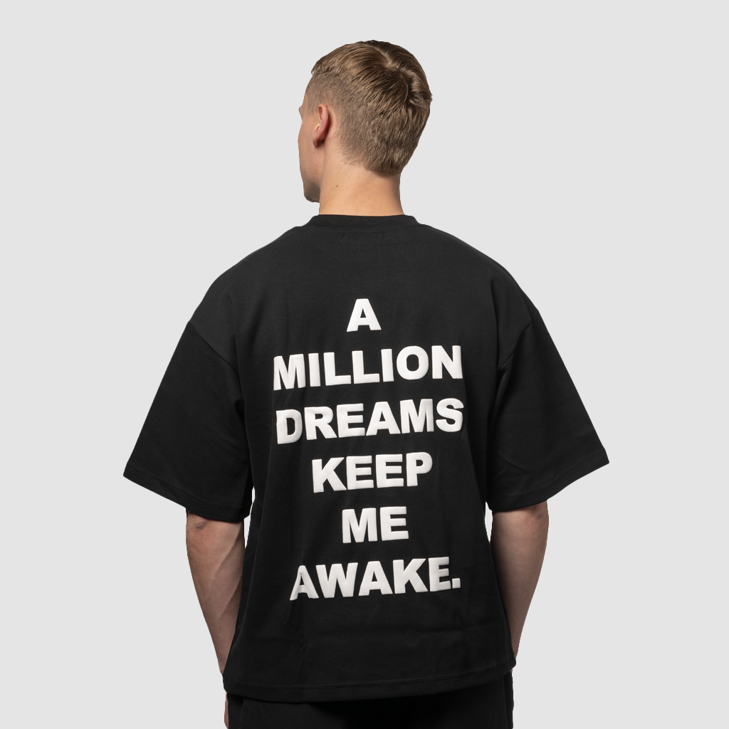 black oversized unisex quote t-shirt LIVINA male front view