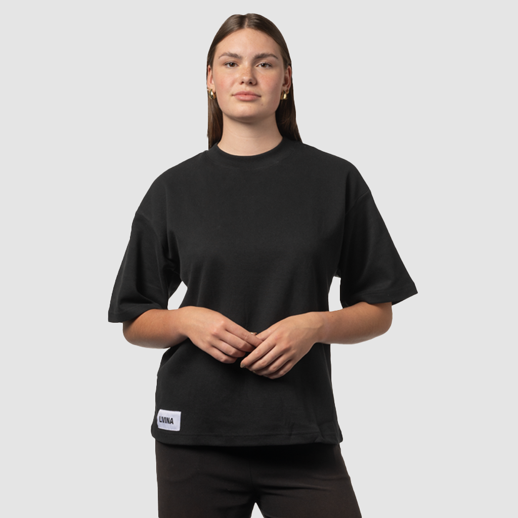 black oversized unisex quote t-shirt LIVINA female front view